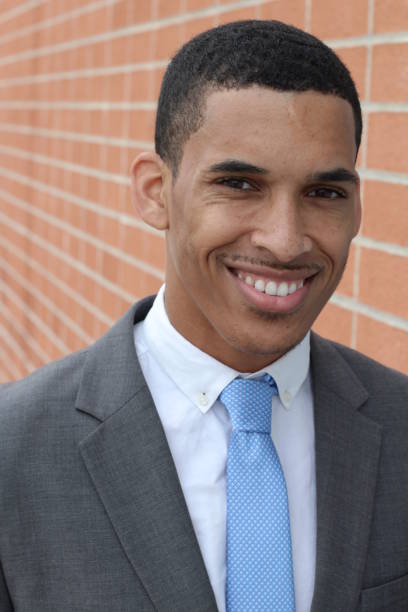 istock Natural young businessman smiling close up 842643826
