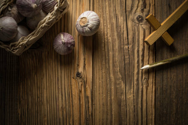 istock fresh garlic, aspen stake and holly cross 842644038