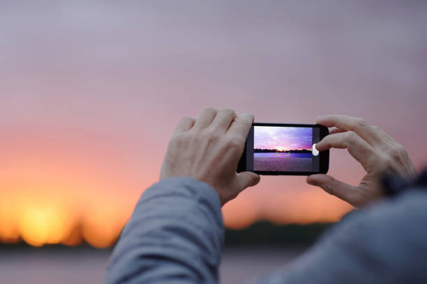 istock Man takes picture with mobile phone 842649642