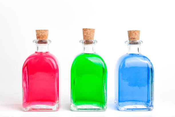 colored bottles. - colourants imagens e fotografias de stock