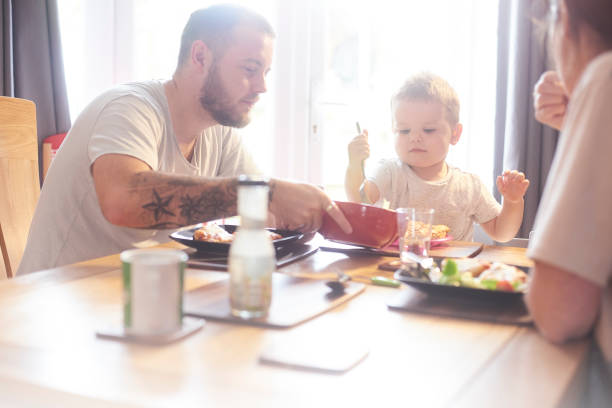 istock Healthy family eating 842664242