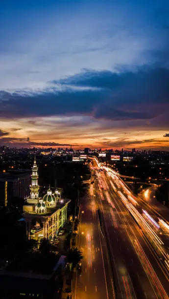 Photo of mosque with road in twilight time