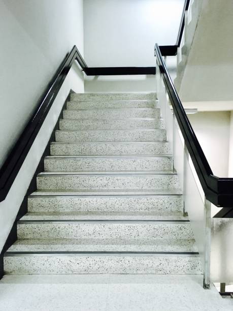 istock Empty White Stairs with Black Banister in A Building 842674560