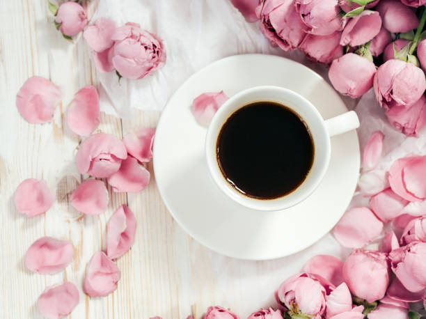 istock Pink rose flower and coffee on pastel background. Flat lay 842677718