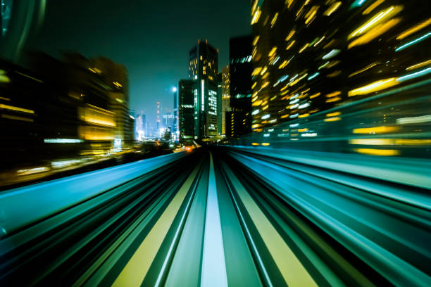 istock Motion blur train moving in city rail tunnel. 842679042