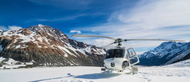 istock Helicopter Landing on a Snow Mountain 842679286