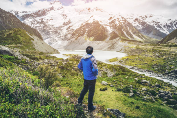 istock Mountain hiker traveling in wilderness landscape. 842679332