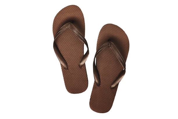istock Brown rubber flip flops, isolated on a white background 842689470