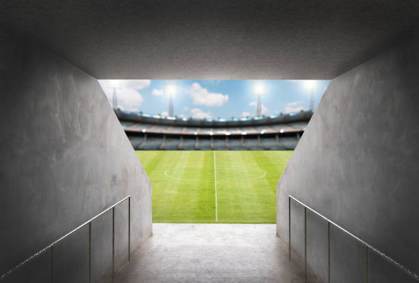 túnel en el estadio con campo verde - bleachers stadium seat empty fotografías e imágenes de stock