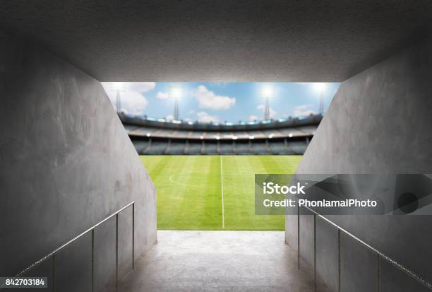 Tunnel In Stadium With Green Field Stock Photo - Download Image Now - Stadium, Tunnel, Soccer