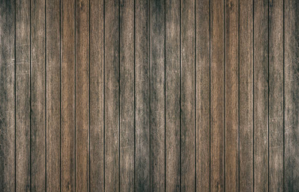 istock Vintage surface wood table and rustic grain texture background. Close up of dark rustic wall made of old wood table planks texture. Rustic brown wood table texture background template for your design. 842703988