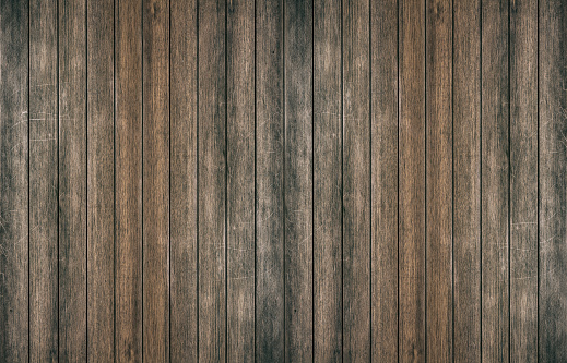 Vintage surface wood table and rustic grain texture background. Close up of dark rustic wall made of old wood table planks texture. Rustic brown wood table texture background template for your design.
