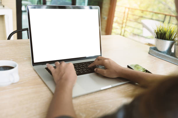 istock close-up waoman typing on laptop keyboard on desk 842707152