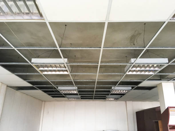 istock structure of ceiling suspension, installation of gypsum plasterboard and light. 842710320