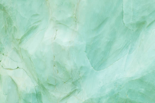 closeup surface marble pattern at green marble stone wall texture background - jade imagens e fotografias de stock