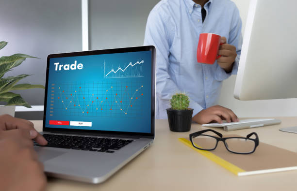 istock professionals working Trade  Finance Forex Graph Chart Concept manager showing reports 842714410