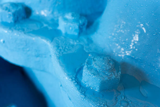 istock water droplets on blue screw nuts and pipe 842714590