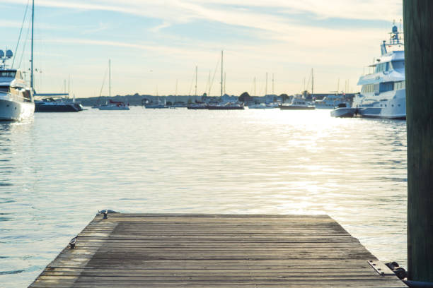 istock Sunset over the sea on the pier 842719596