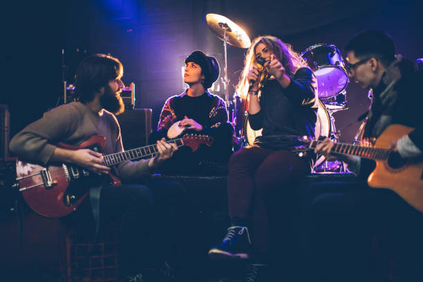 istock Band on stage in night club 842726806