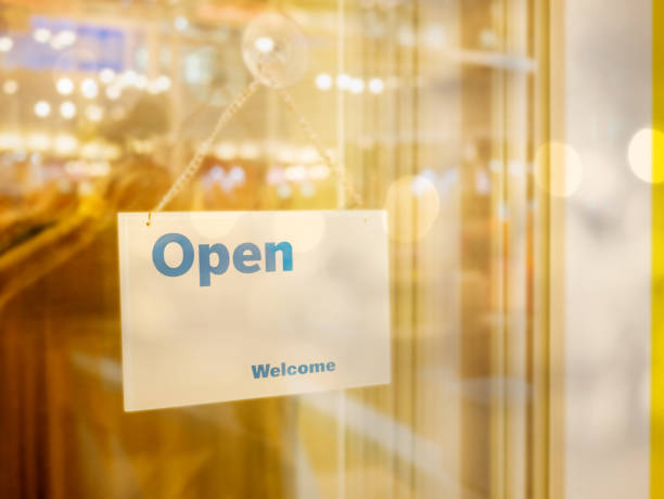istock Open sign on a glass door 842727432