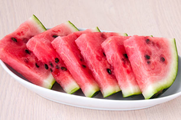 istock Ripe watermelon slices in a plate is on the table 842727960