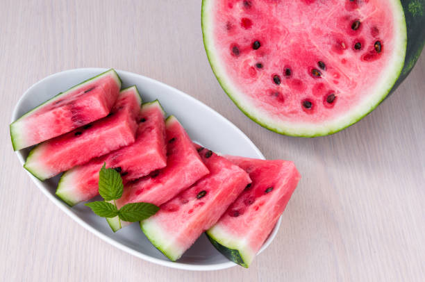 istock Ripe watermelon slices in a plate is on the table 842730122