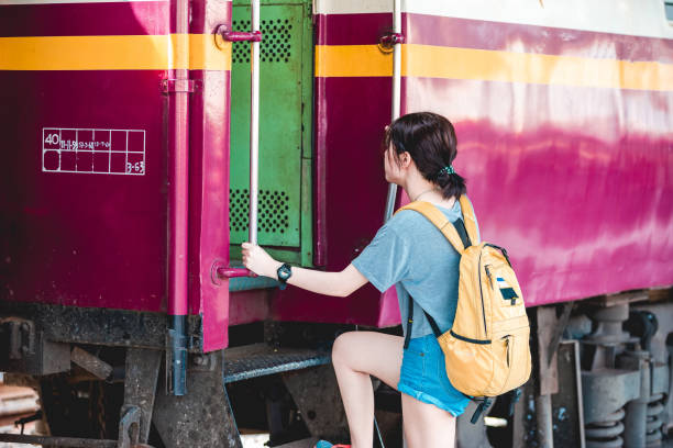 istock Asian girl at train station. 842739056