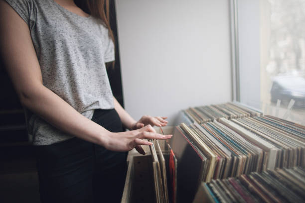 istock Choosing retro vinyl records. Music background 842740264
