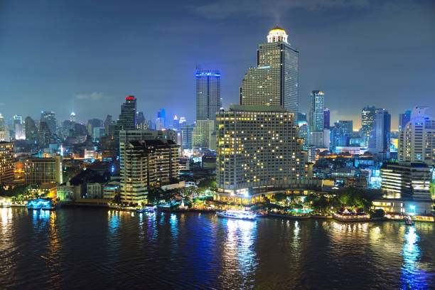 istock Downtown Bangkok city at night, Chao Phraya River, Thailand 842743310