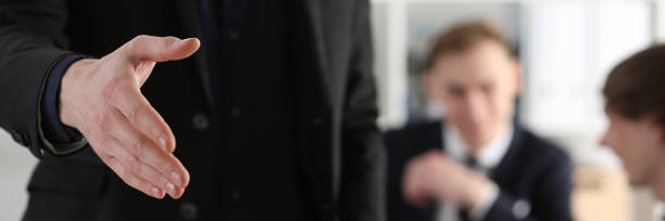 istock Businessman offer hand to shake as hello in office 842744574