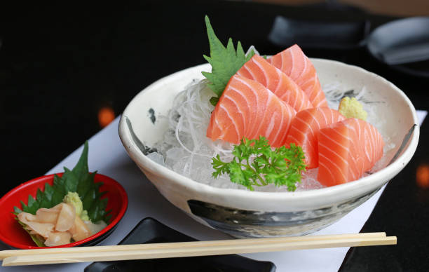 istock Close-up Sliced salmon raw sashimi on ice. 842751300