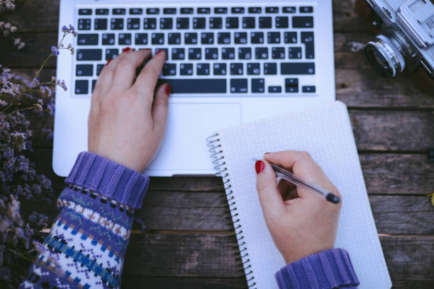 istock Woman working at home office hand on keyboard close up 842751722