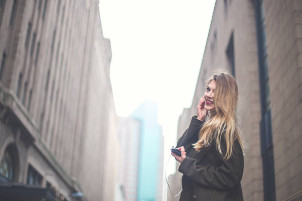 istock Adorable blond listening music 842753096