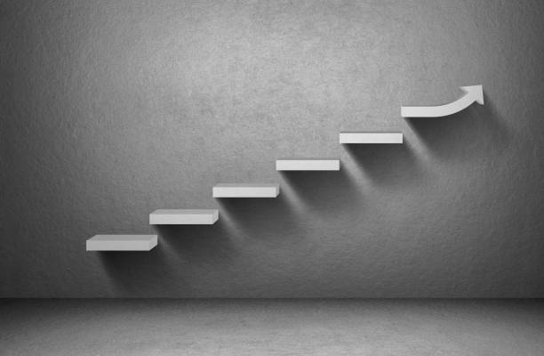 istock Rising arrow graph on staircase on grey background, business concept 842759896