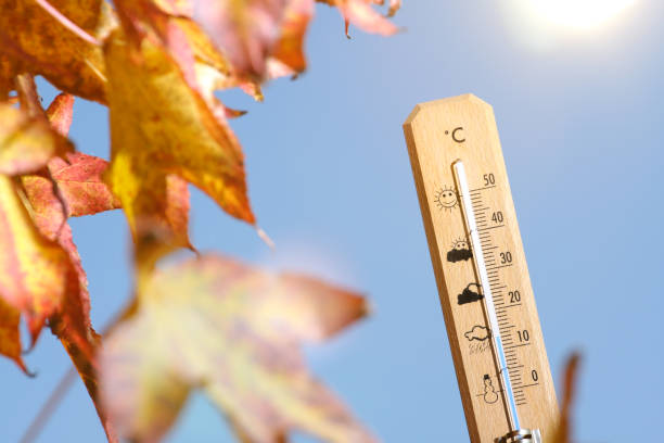 istock nice weather in the autumn shown with mercury thermometer 842761064