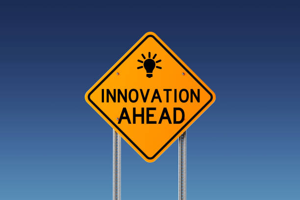 Yellow Innovation ahead traffic sign on blue sky. Innovation concept. Front view. Horizontal composition with copy space. Clipping path is included.