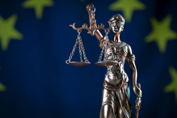 istock Law and Justice symbols. EU flag background. 842763298