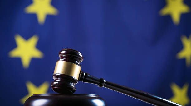 istock Law and Justice symbols. EU flag background. 842763382