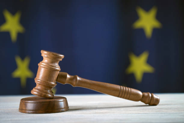 istock Law and Justice symbols. EU flag background. 842764738