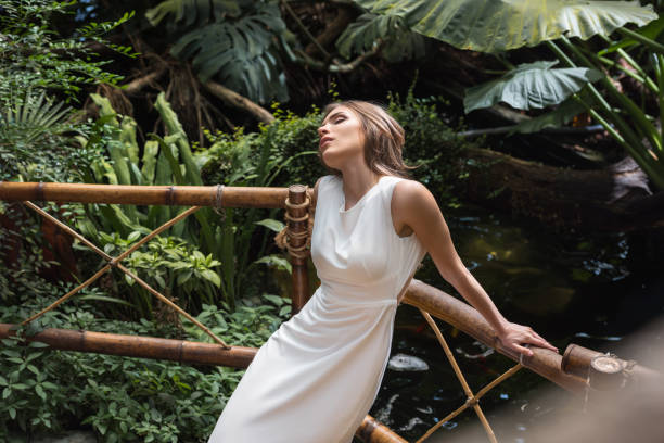 istock sensual woman in tropical orangery 842769578