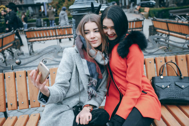 istock Two girl in a bench 842771816