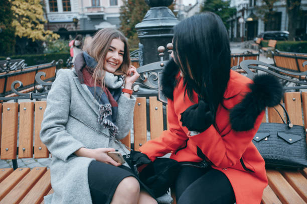 istock Two girl in a bench 842771924