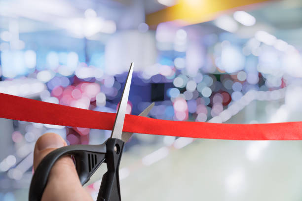 Scissors are cutting red ribbon. Opening ceremony or event. Scissors are cutting red ribbon. Opening ceremony or event. launch event photos stock pictures, royalty-free photos & images