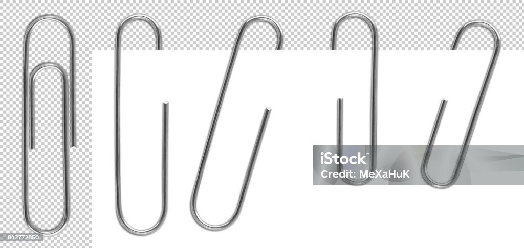 Metal paper clips isolated and attached to paper Classic metal paper clips isolated and attached to paper in different way. Paper Clip Stock Photo