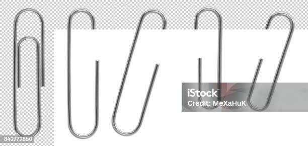 Metal Paper Clips Isolated And Attached To Paper Stock Photo - Download Image Now - Paper Clip, Binder Clip, Paper