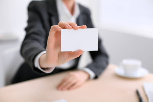 istock Business woman giving visit card 842772896