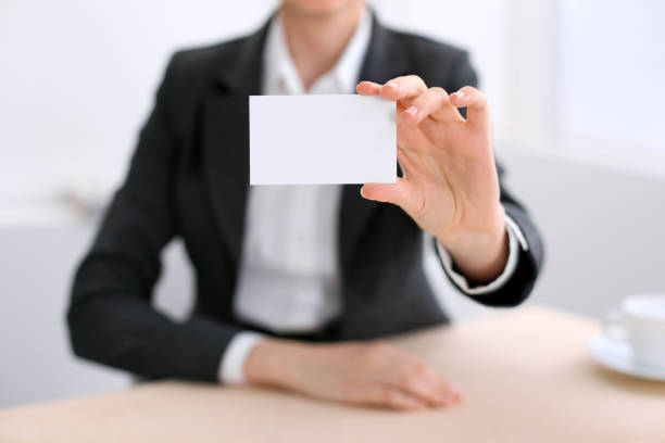 istock Business woman giving visit card 842772944