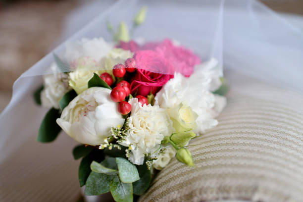 Beautiful wedding colorful bouquet for bride. Beauty of colored flowers. Close-up bunch of florets. Bridal accessories. Female decoration for girl. Details for marriage and for married couple