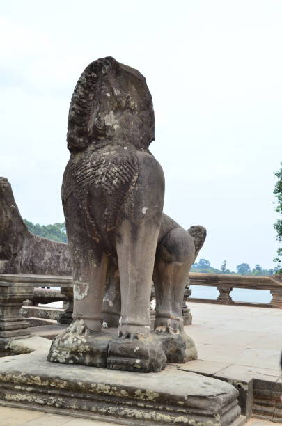 istock Sculpture in front of Angkor Wat, Cambodia. 842780982