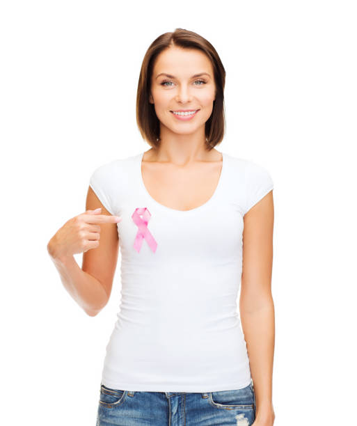 woman in blank t-shirt with pink cancer ribbon - shirt women pink jeans imagens e fotografias de stock